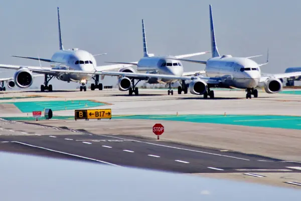 planes on runway on airport