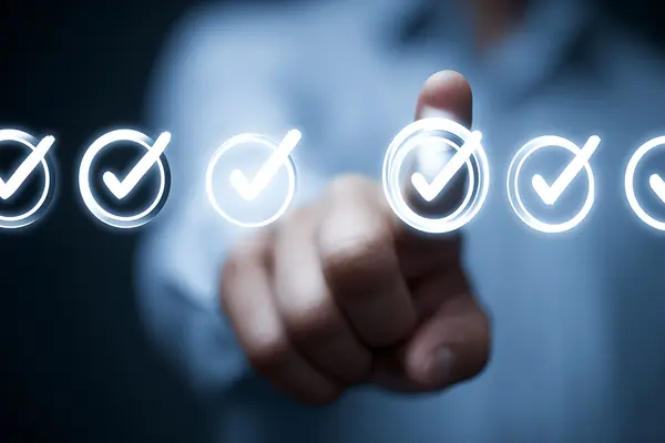 Digital selection and checkmark icons representing quality control and verification