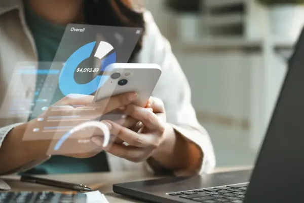 erson using smartphone to track personal expenses with digital dashboard and financial analytics, showing budget control, spending overview, and money management for efficient financial planning.