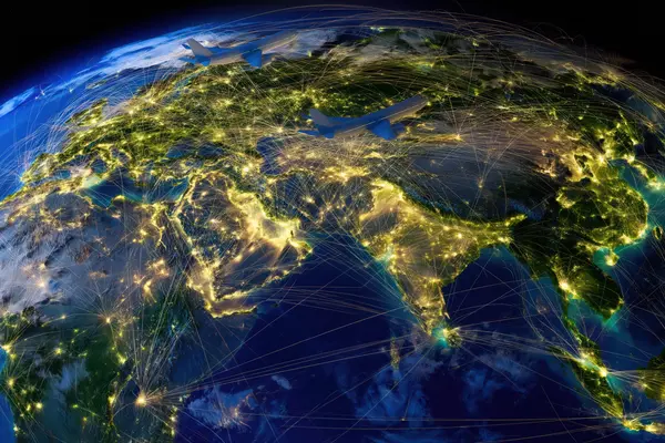 Night-time view of Earth with global flight routes and connected air traffic networks