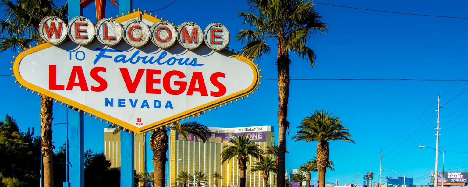 Famous Las Vegas sign on bright sunny day (© Shutterstock/Elnur)