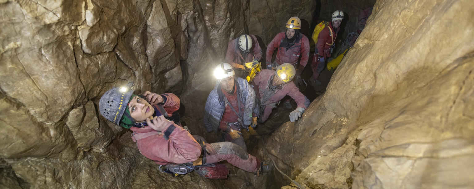 Nikolett Rehány and the rescue team descending into the cave